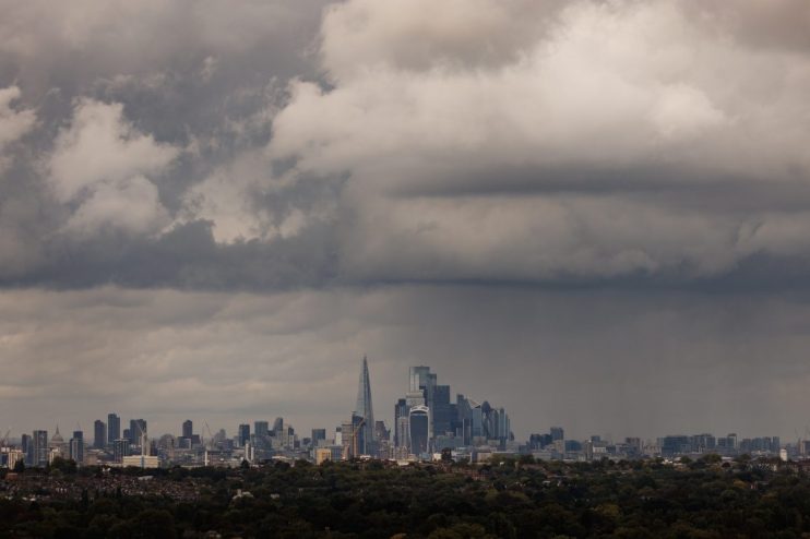 LONDON, UNITED KINGDOM - SEPTEMBER 23: Heavy rain clouds pass over the city of London skyline on September 23, 2024 in London, United Kingdom. The Met Office has issued amber weather warnings for heavy rain in the Oxford region with yellow warnings stretching from Middlesbrough to the South Coast. (Photo by Dan Kitwood/Getty Images)