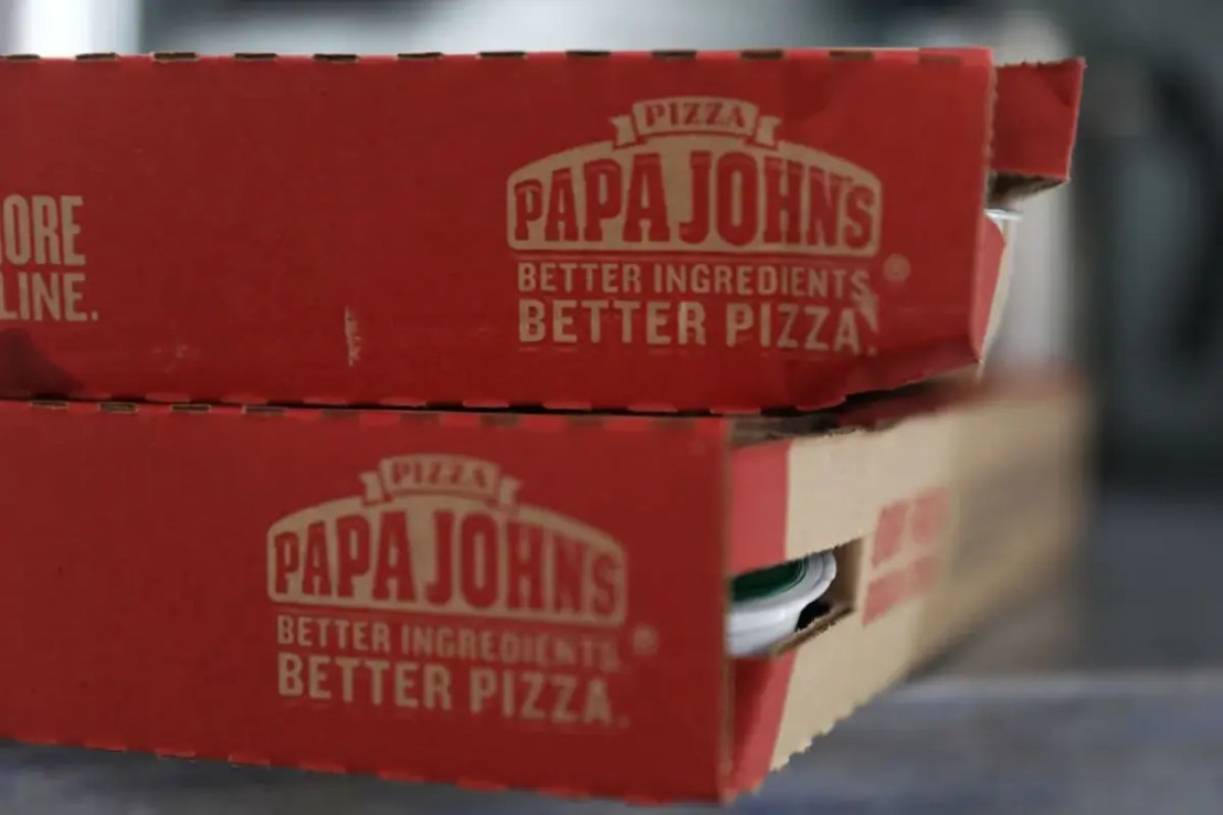 Papa Johns is eyeing its first UK profit since 2021. (Photo illustration by Joe Raedle/Getty Images)