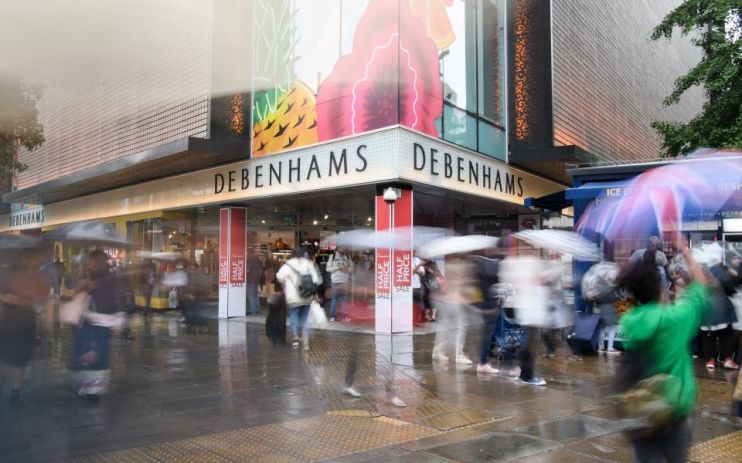 Debenhams store will people walking past in Oxford Street