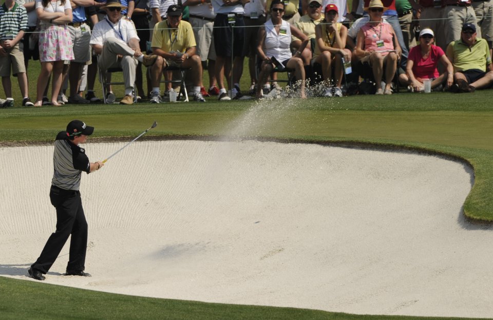 Rory McIlroy of Northern Ireland hits a